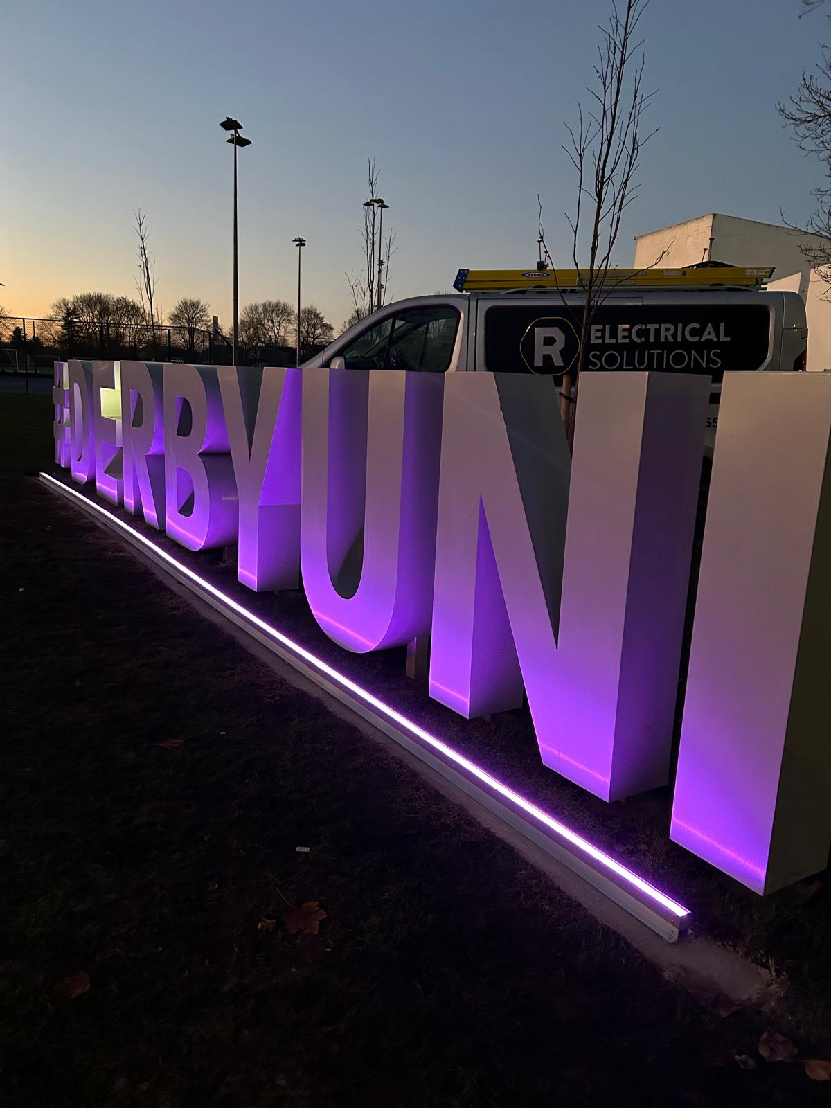 Illuminated Derby Uni signage letters with colour-changing LED lighting installed by R Electrical Solutions