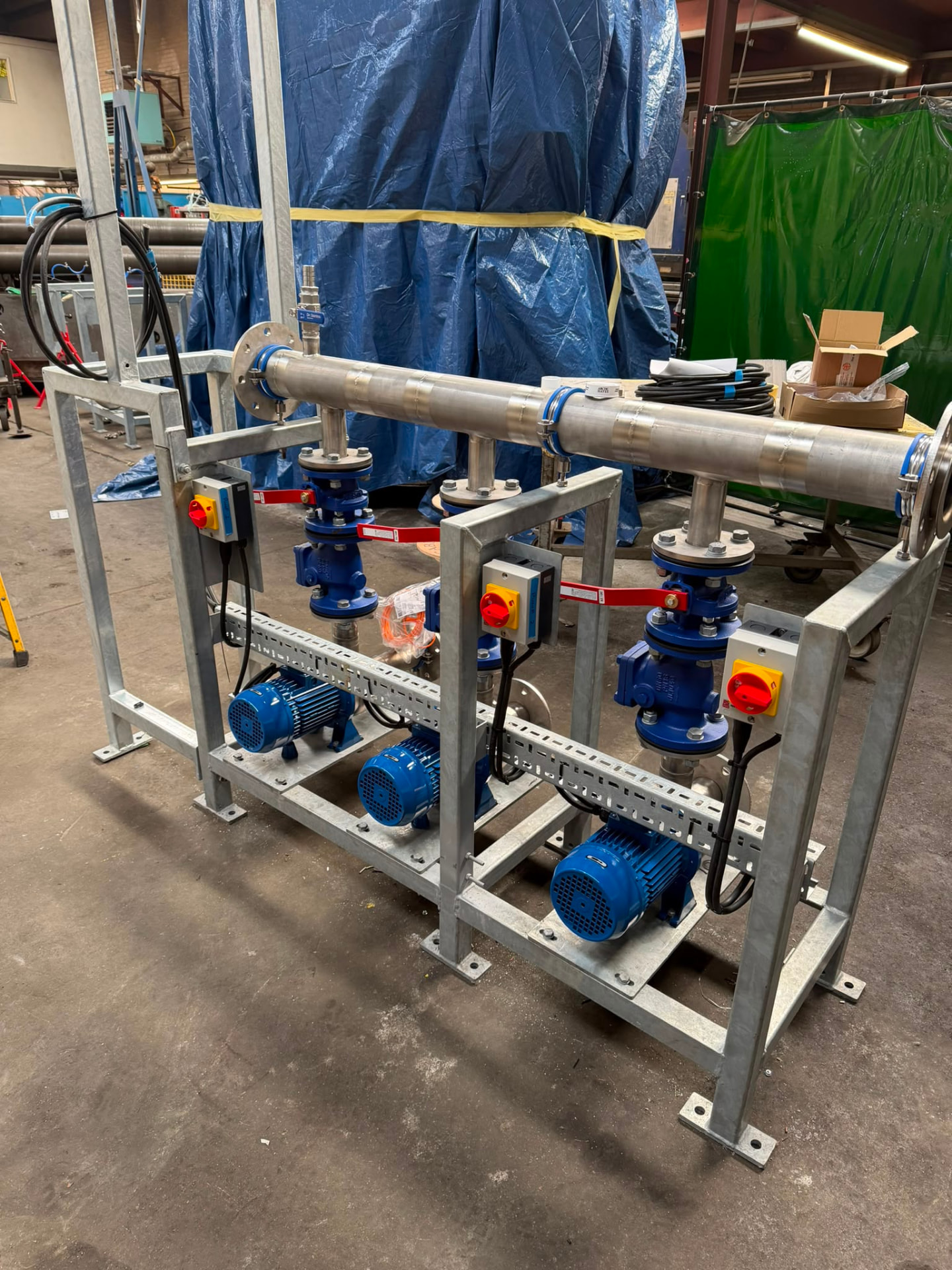 Industrial pump skid with motor control and stainless steel pipework